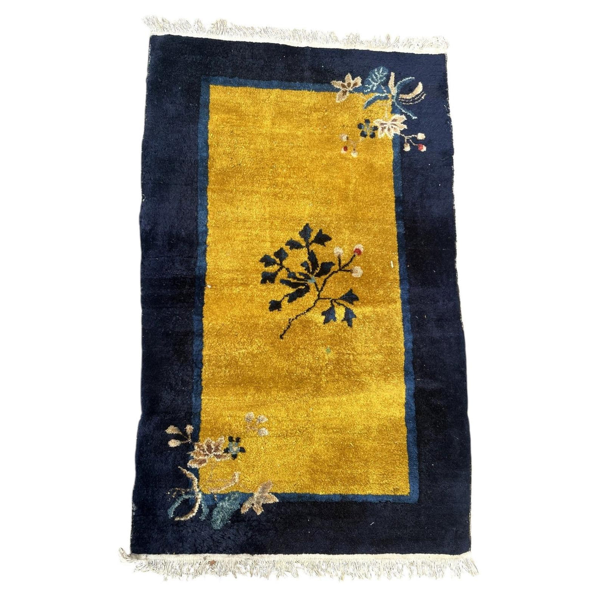 Full Chinese Art Deco wool rug with gold field, navy border and floral sprays, 1B1007