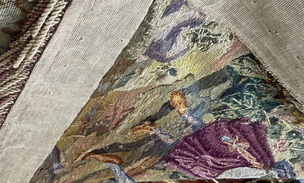 Close-up of reverse yarn floats beneath the backing