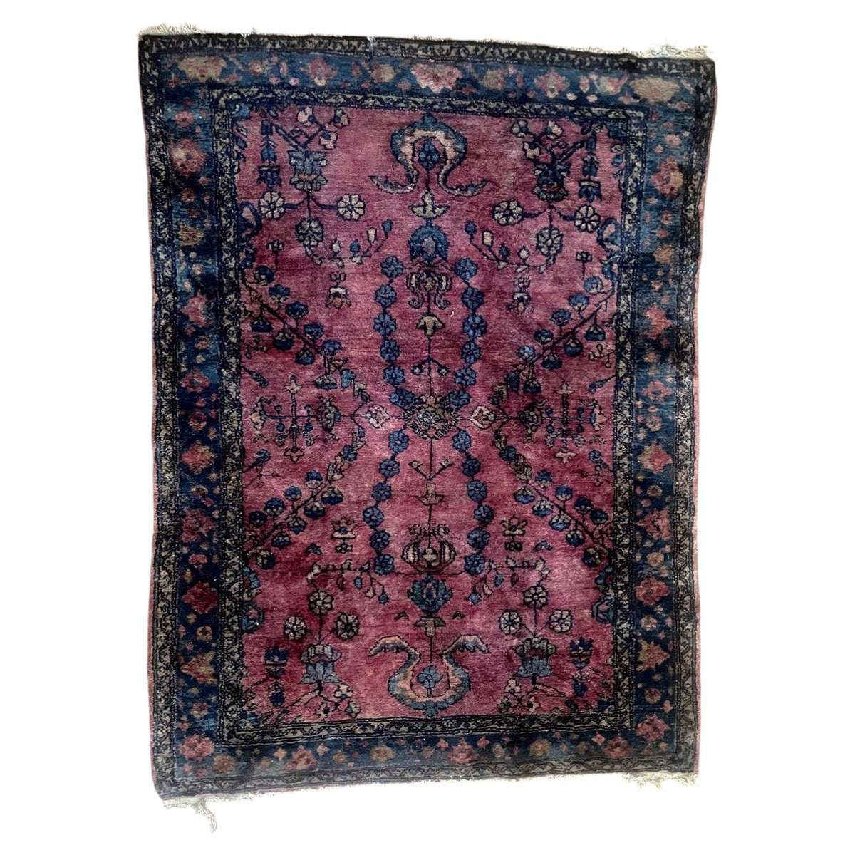 Handmade wool rug 1B1012 with rose-pink field and navy floral border