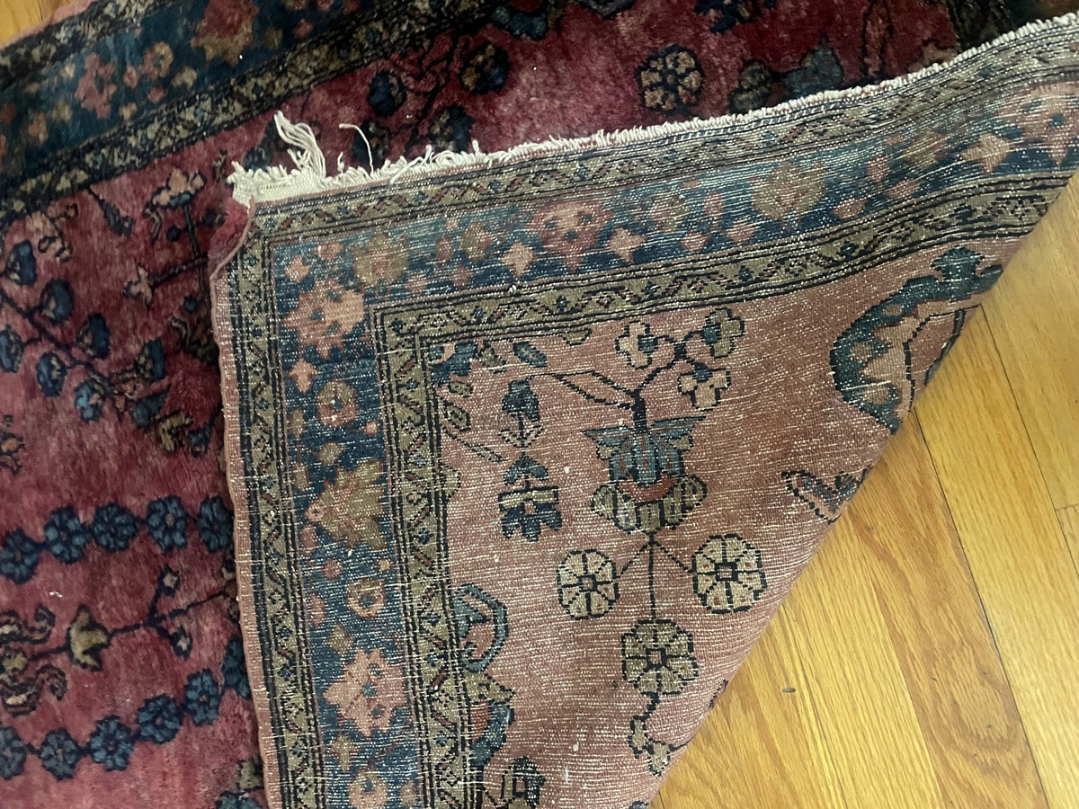 Folded corner revealing the patterned knotted reverse
