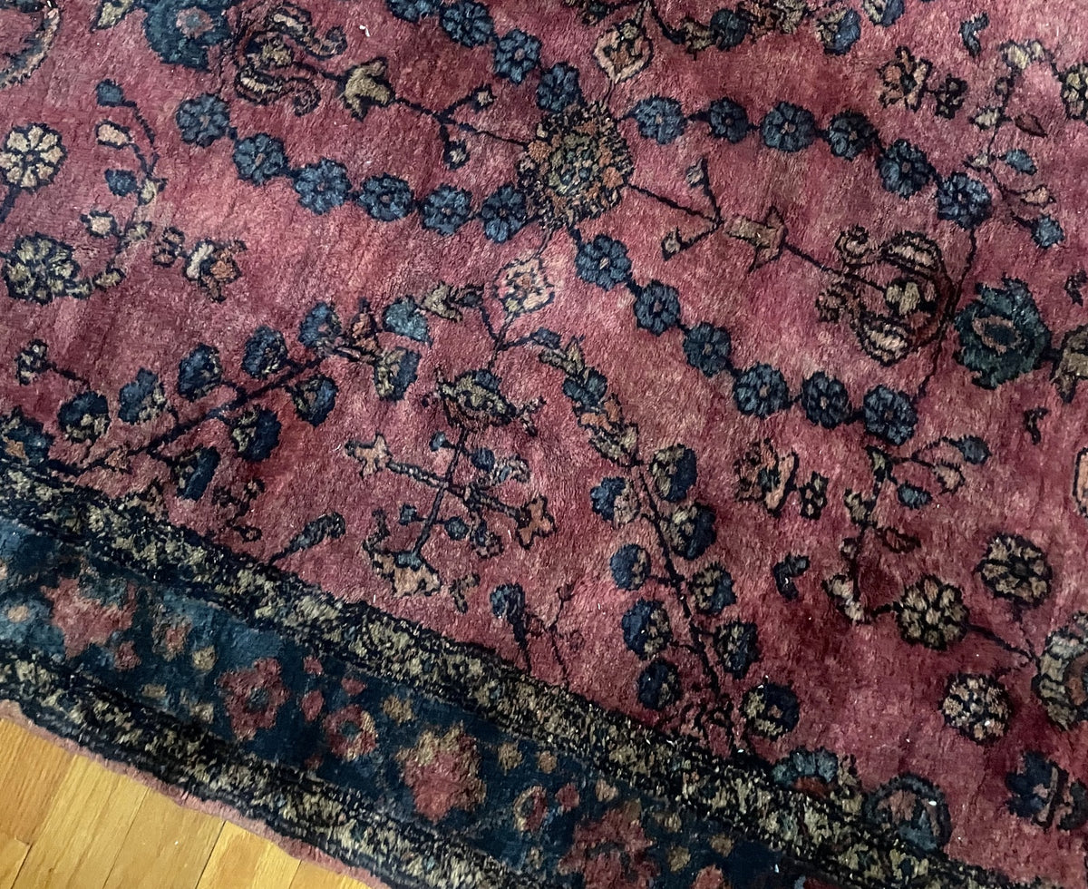 Rose field with stylised flowers beside the navy border