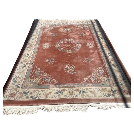 Chinese wool rug 1B1015 with coral field, circular floral medallion and ivory border