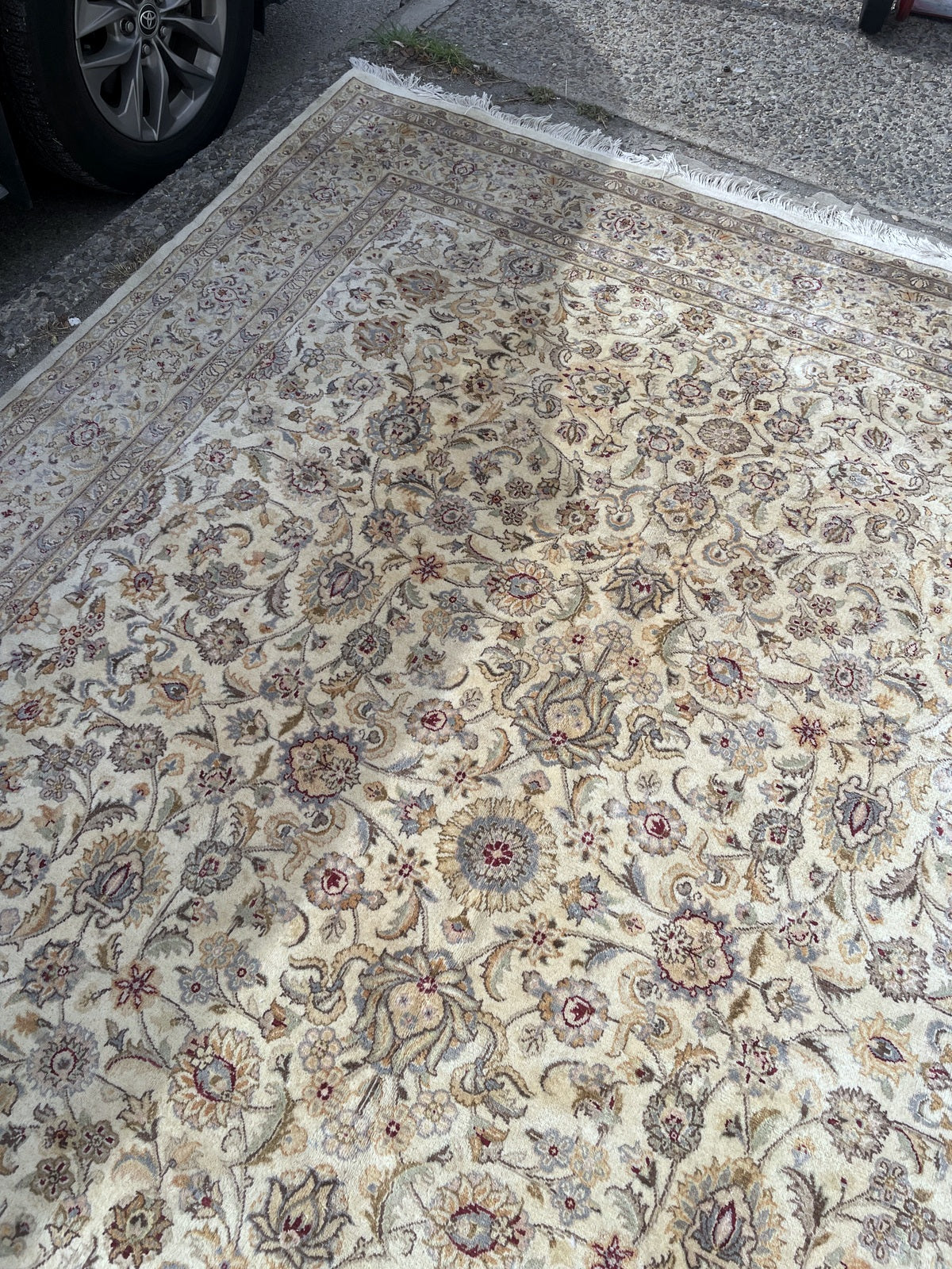 Lengthwise view showing continuous floral scrollwork without a dominant medallion