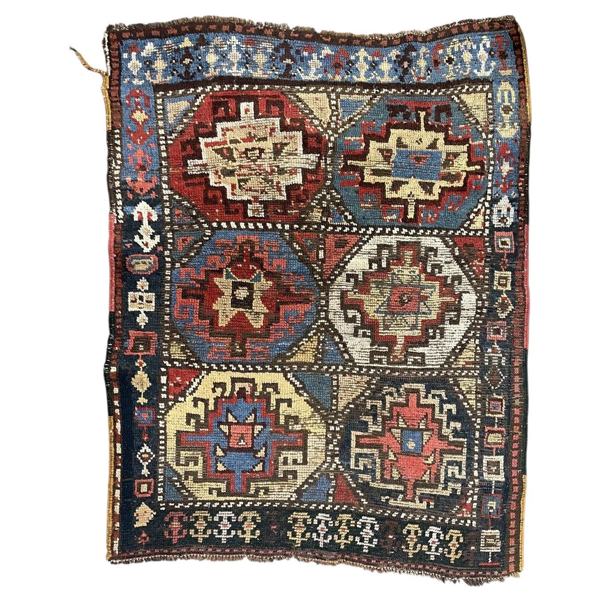 Antique wool rug 1B1017 with six octagonal medallions and geometric borders