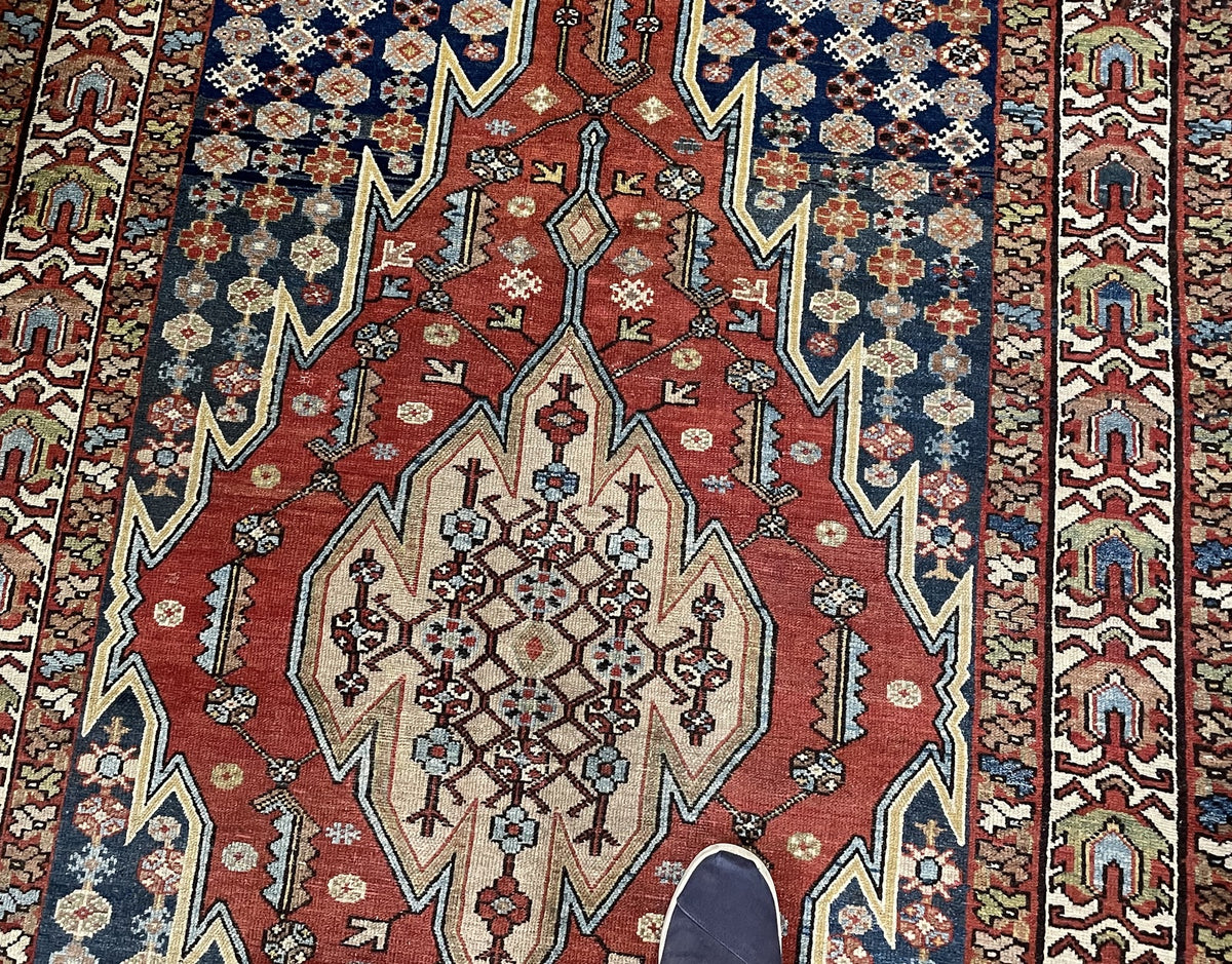 Folded corner revealing the patterned reverse and end finishing