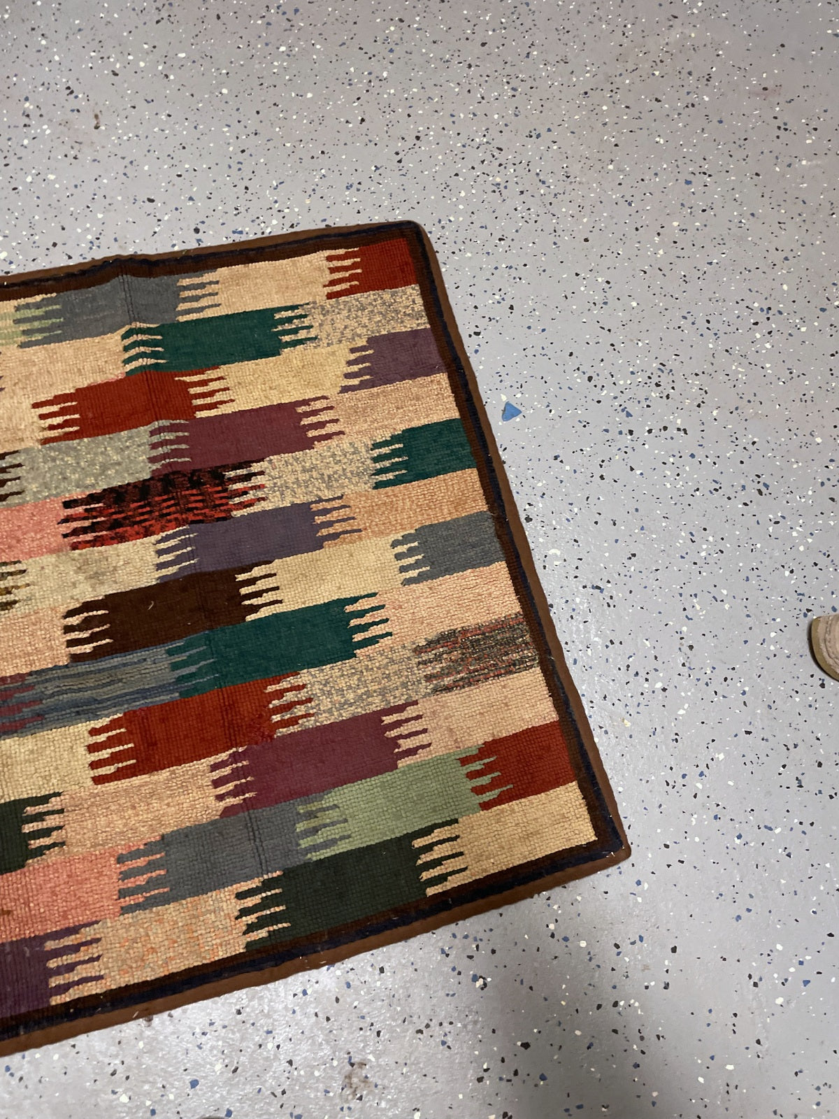 Interlocking geometric blocks showing variations in wool-loop texture and height.
