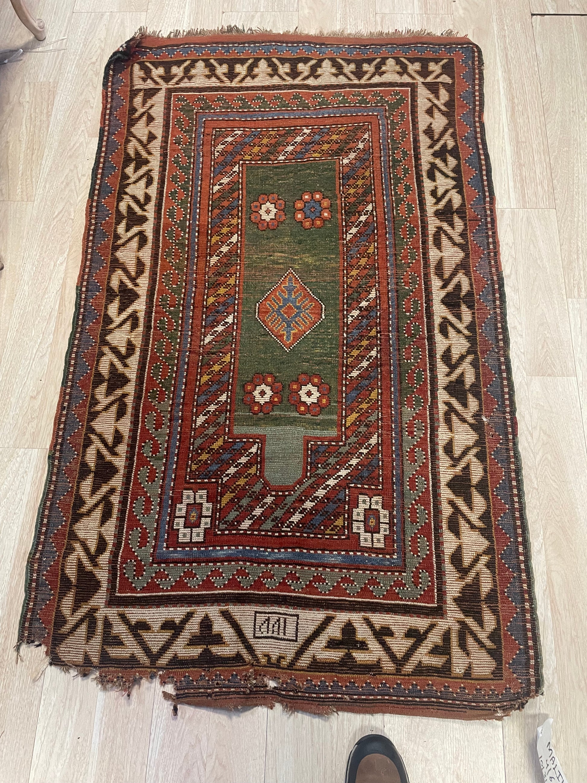 Hand-knotted wool construction of a 19th-century Borchalu Kazak, showing the lustrous, full pile and tribal weave.

