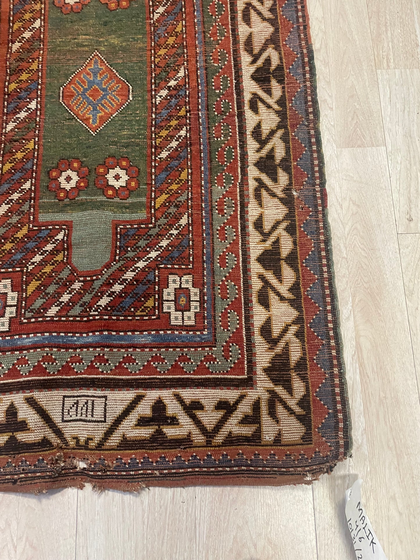 Antique rug from the Borchalu district, Kazak group, dating to the 1860s, with authentic tribal artistry.

