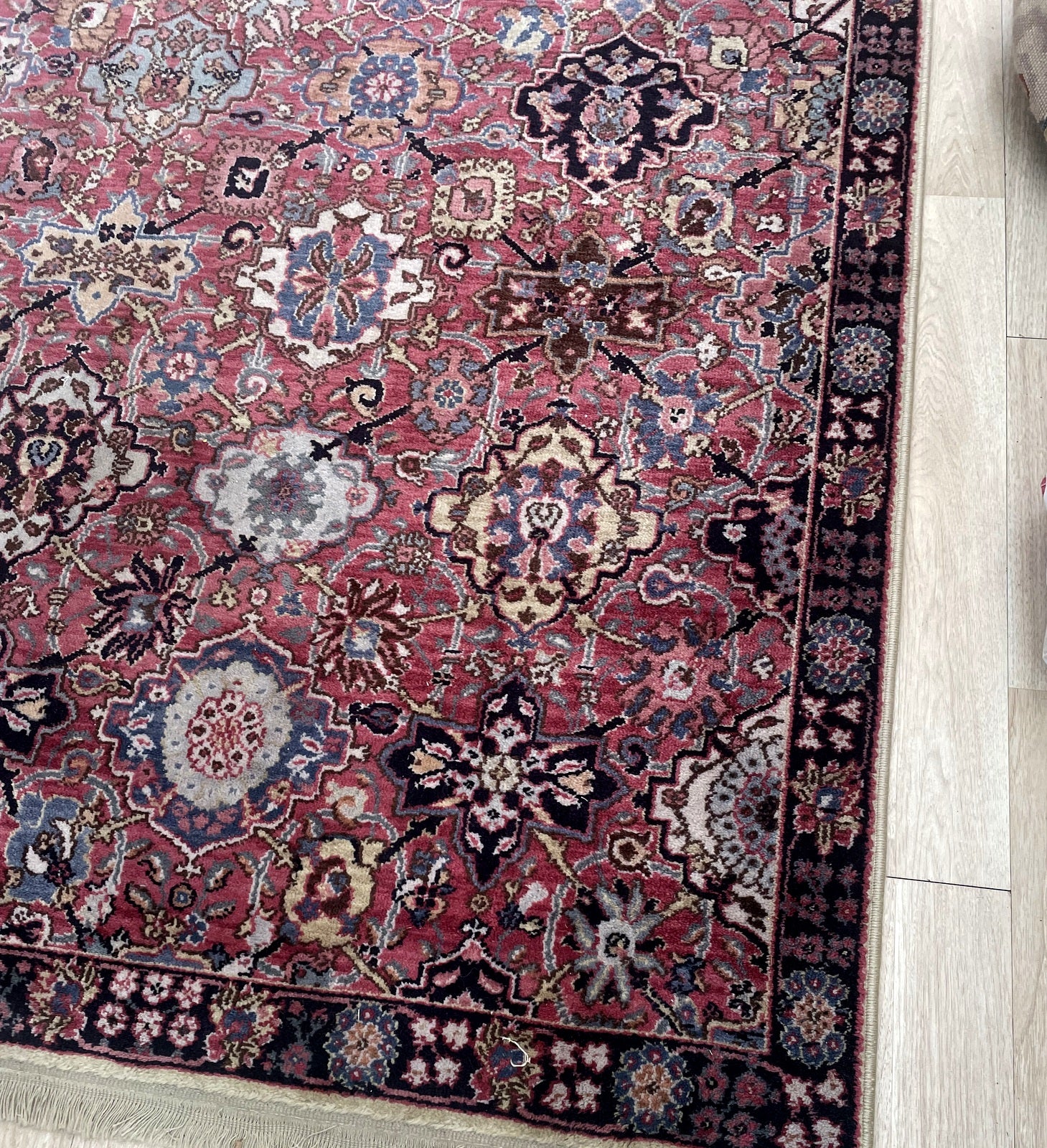 Mid-century machine-woven rug ideal for foyer bedroom or small living area in interior setting

