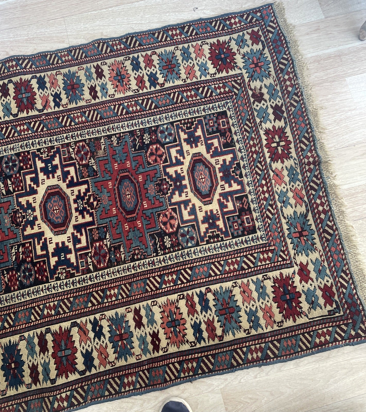 Rare Caucasian tribal carpet ideal for collectors or contemporary interior in room setting


