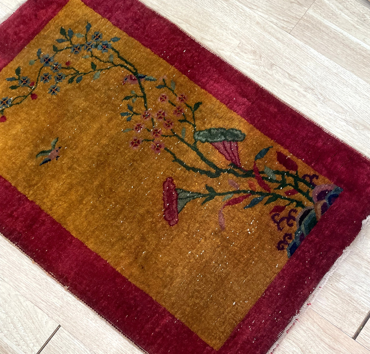 Handmade Chinese accent rug circa 1920s ideal for entryway study or sophisticated bedroom in interior

