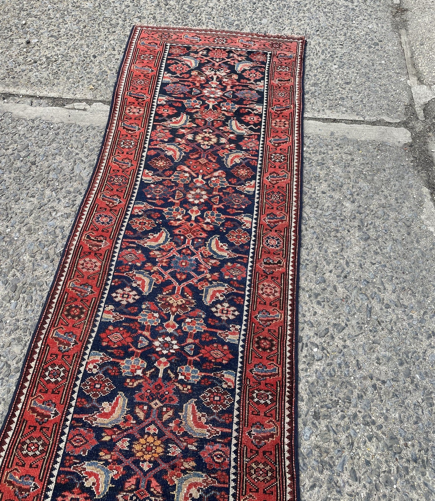 High-contrast rhythmic Mina Khani or geometric diamond lattice design across deep indigo field