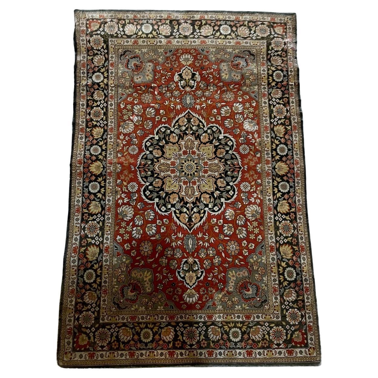 Vintage 1970s handmade Indian silk rug 2.1x3.2 ft full view with central medallion and floral field on deep red ground

