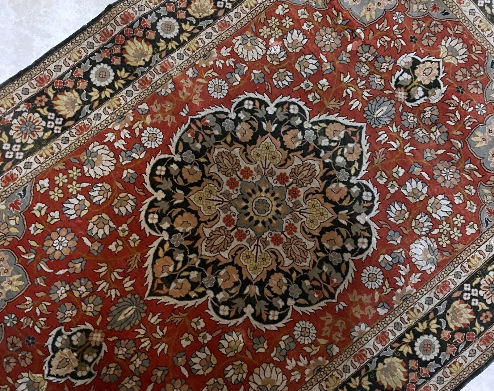 Luxurious 1970s silk rug ideal as wall hanging bedside accent or atop furniture for vintage elegance in interior

