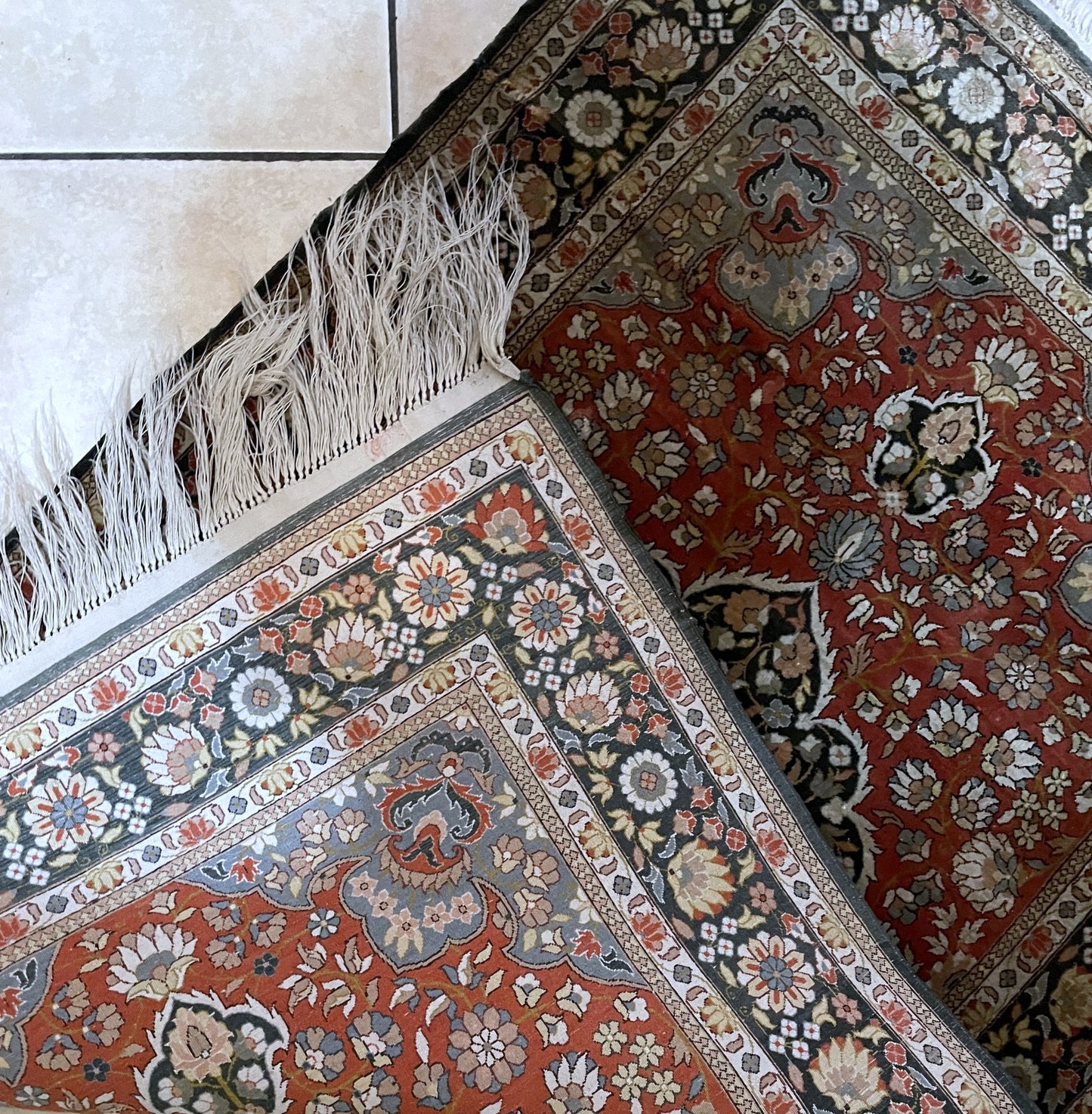 Indian silk rug texture and luminous pile detail with strong consistent sheen across entire surface

