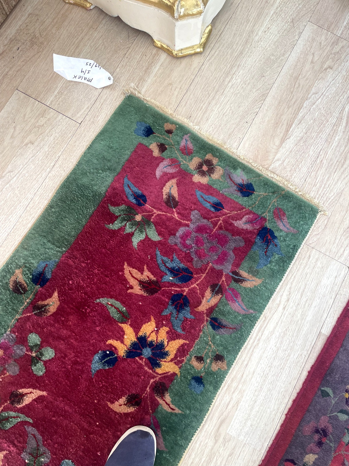 Luxurious 1920s runner-lite size rug ideal for entryway foot of bed or colorful accent in interior setting

