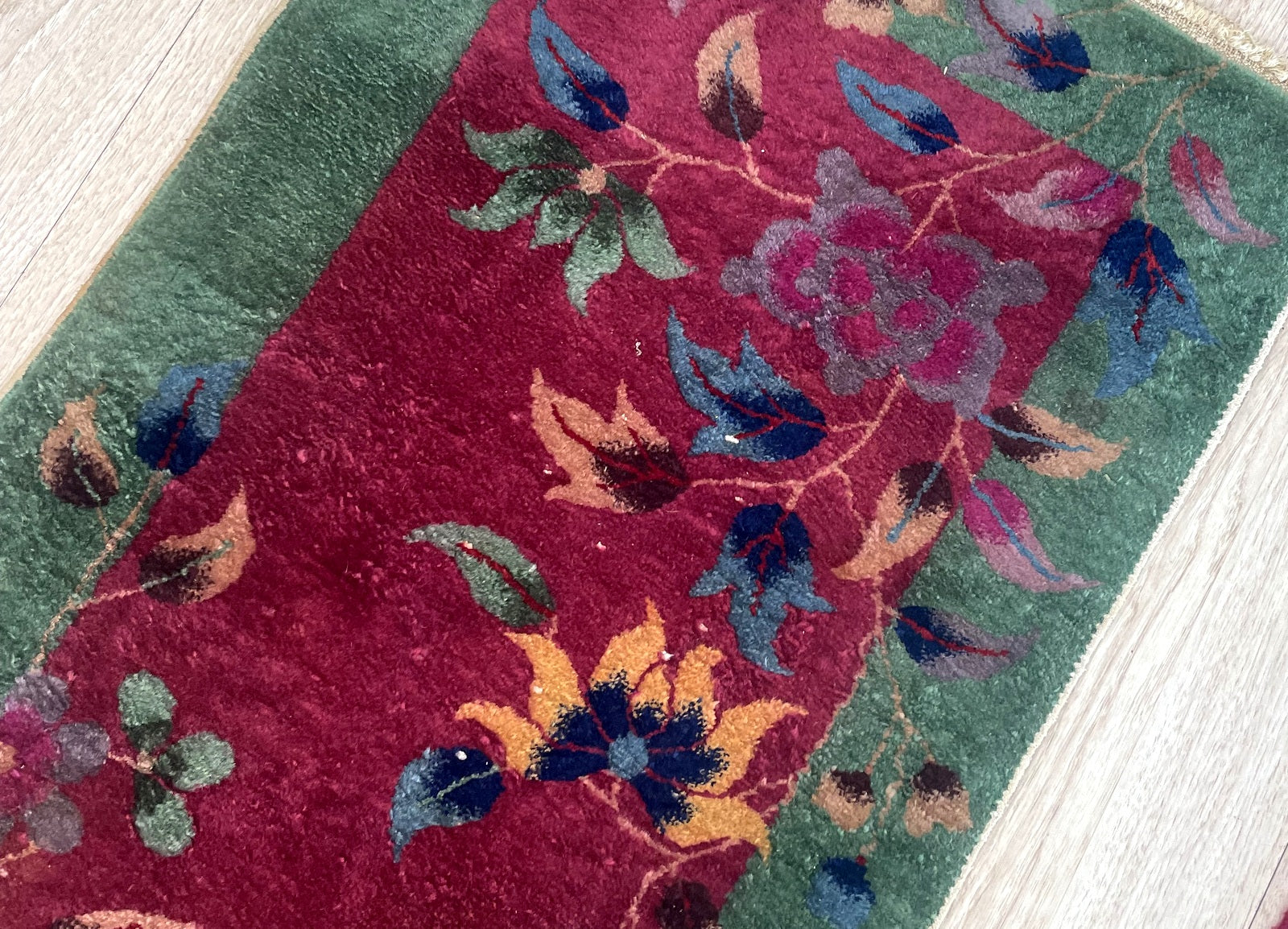 Hand-knotted Chinese rug circa 1920s with royal purple gold sage green and ivory color palette

