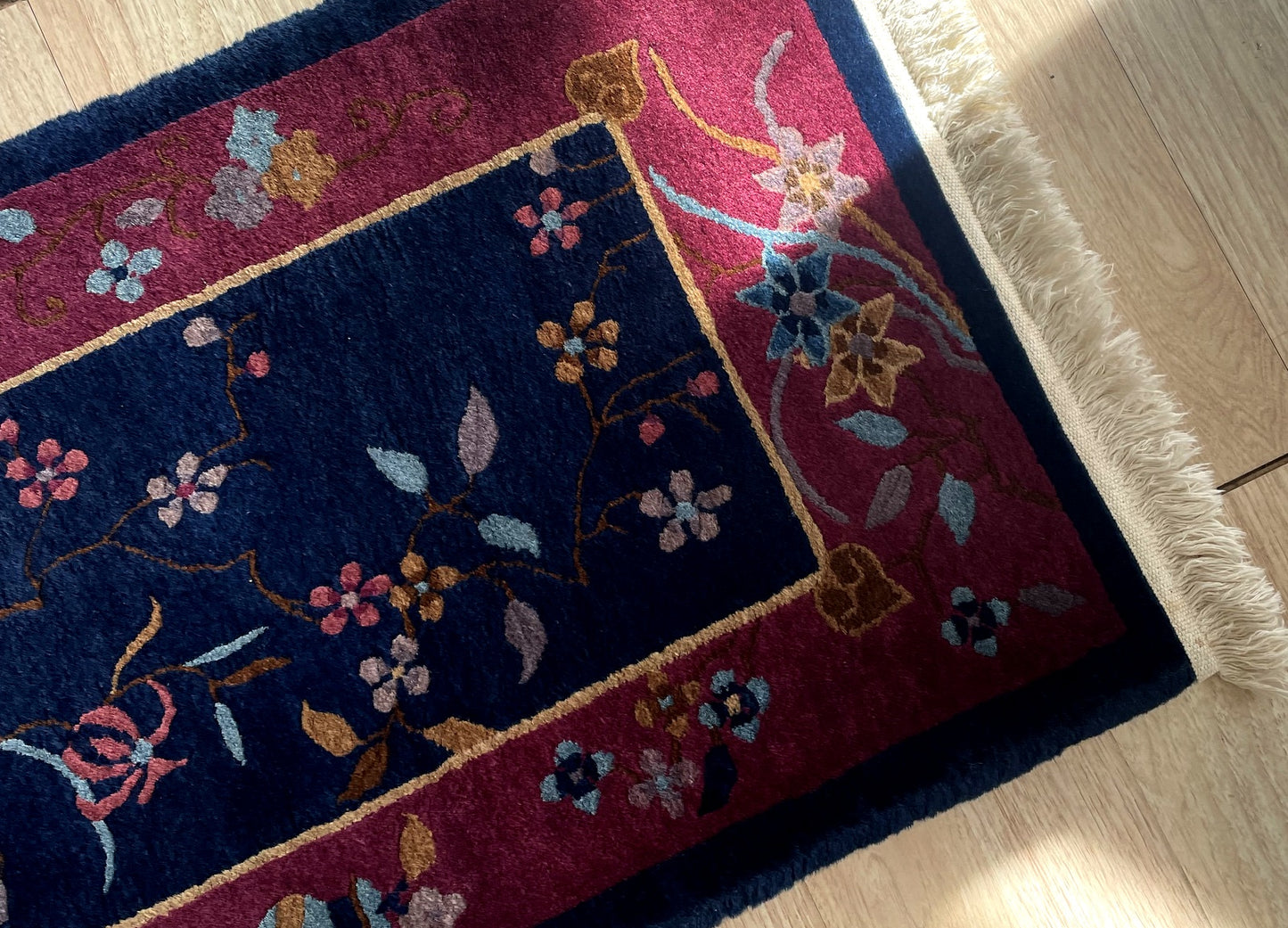 Antique Chinese Art Deco rug design elements featuring pioneering Nichols style with vibrant floral asymmetry