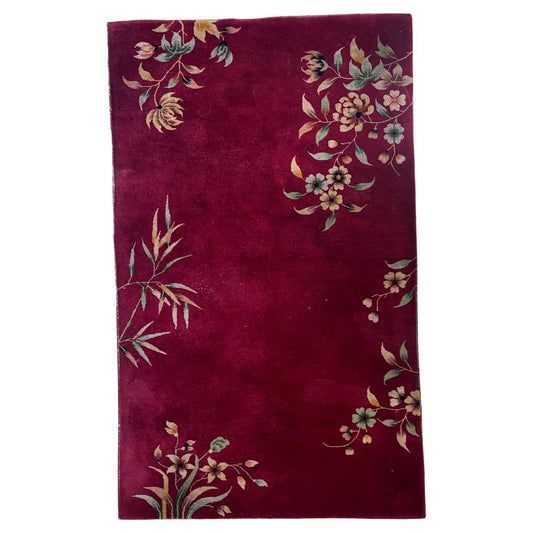 Antique Chinese Art Deco rug 1920s hand-knotted wool 4.1x7 ft full view with bold jewel-toned field and asymmetrical floral sprays

