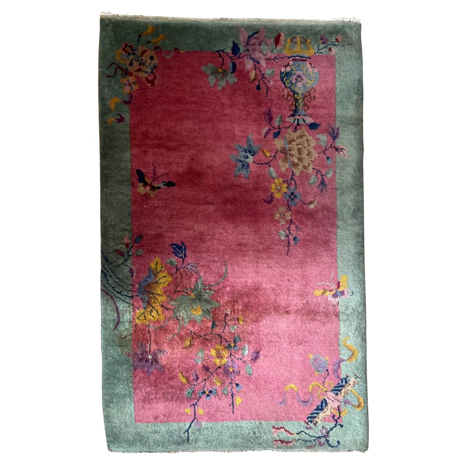 Antique Chinese Art Deco scatter rug 1920s hand-knotted wool 3.1x5 ft full view with floating floral spray on deep lustrous field

