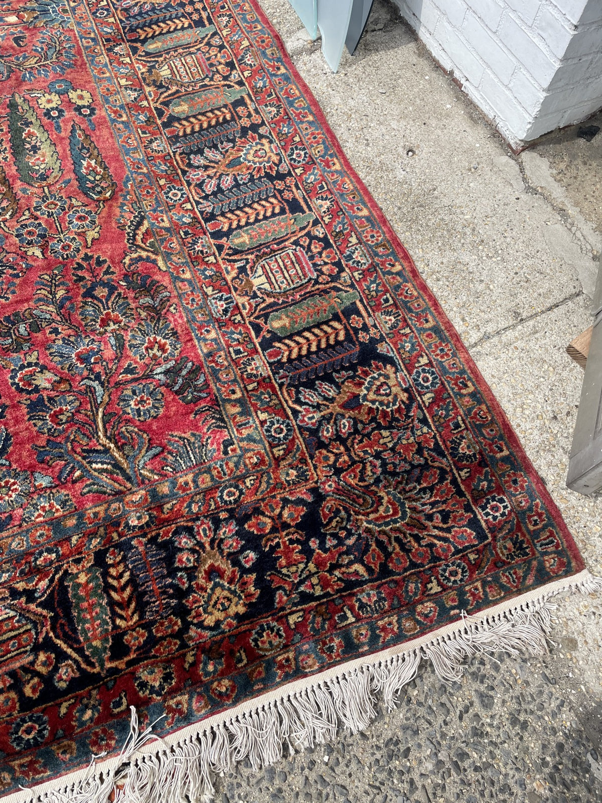 Persian Sarouk rug back view, showing hand-knotted structure and weave