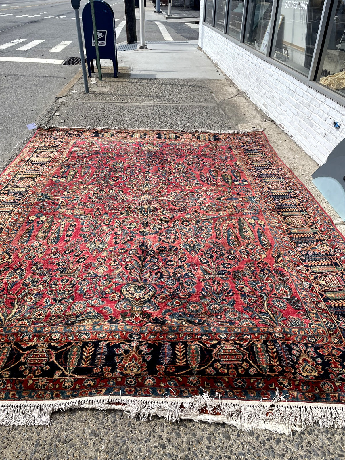 Antique Sarouk rug fringe detail, handmade wool with signs of age