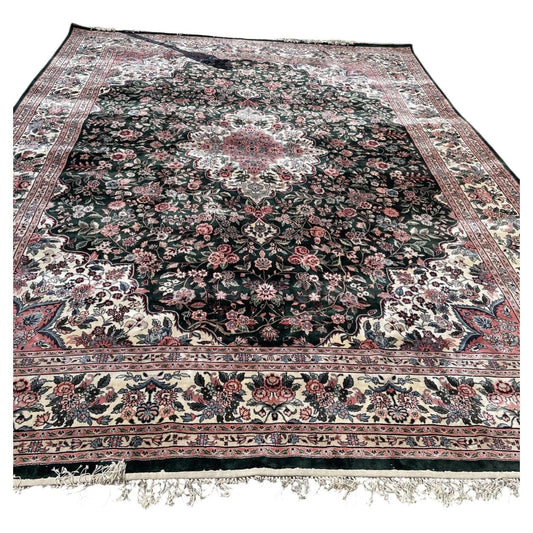 Vintage 1970s Chinese silk rug, handmade with floral medallion and deep green field