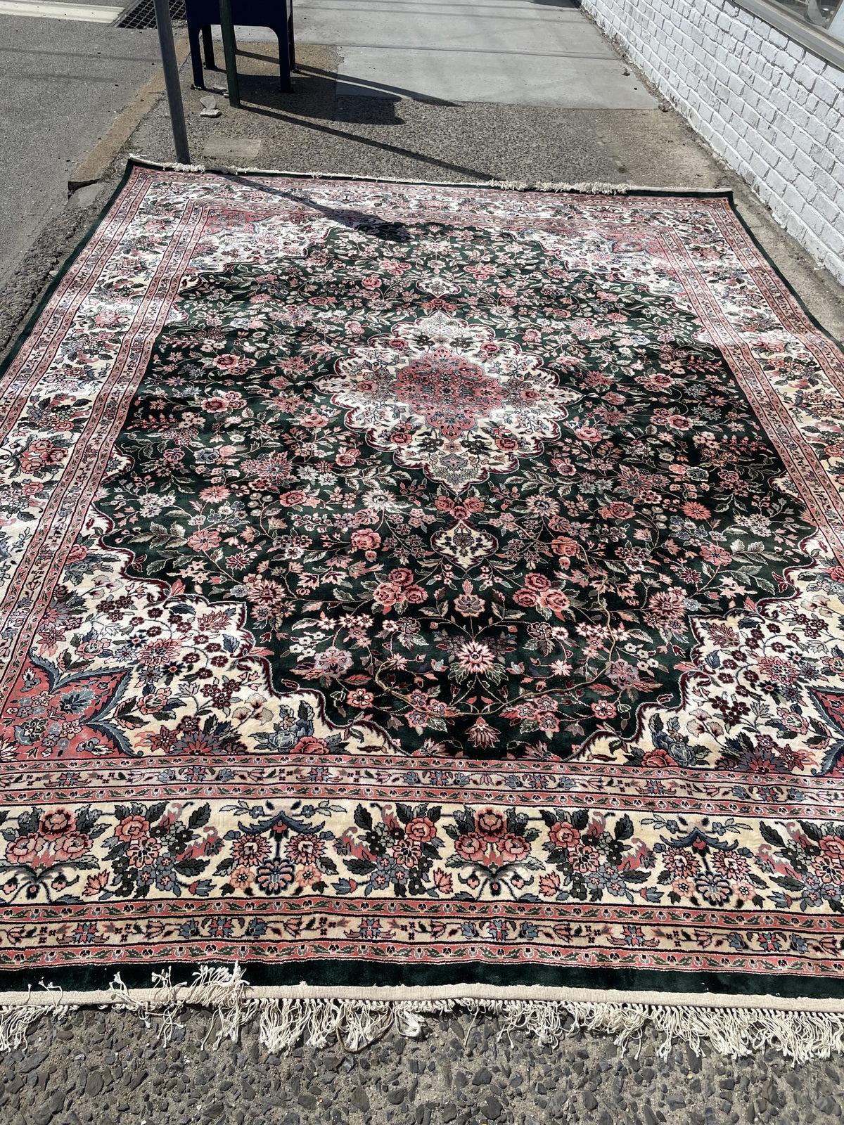 Vintage Chinese silk rug close-up, showing luminous silk texture and sheen