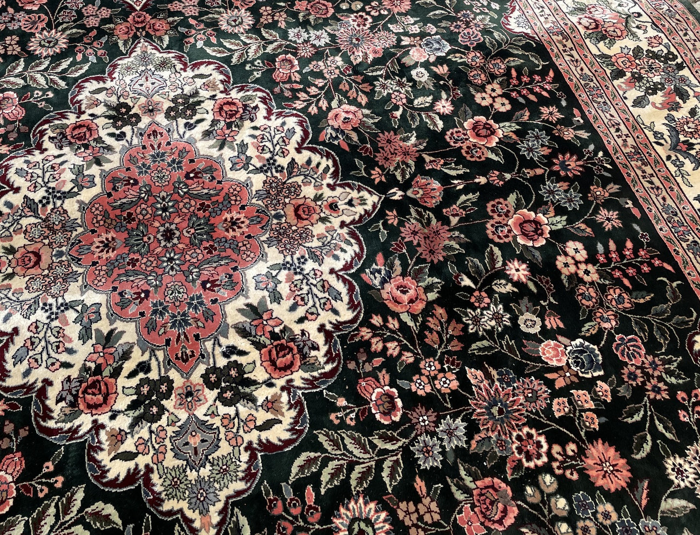 Vintage Chinese rug corner detail, showcasing fine silk weaving and craftsmanship