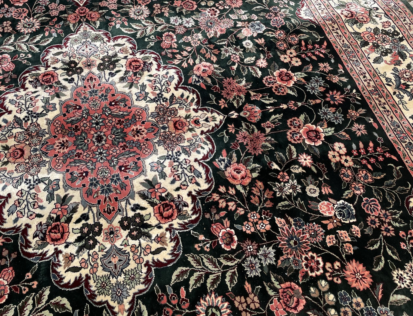 Vintage Chinese rug corner detail, showcasing fine silk weaving and craftsmanship