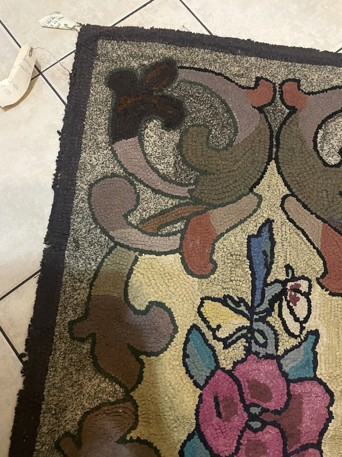 Antique hand-hooked wool rug from the New England/Mid-Atlantic tradition, circa 1900s, showing honest pile flattening and light edge fraying consistent with age.

