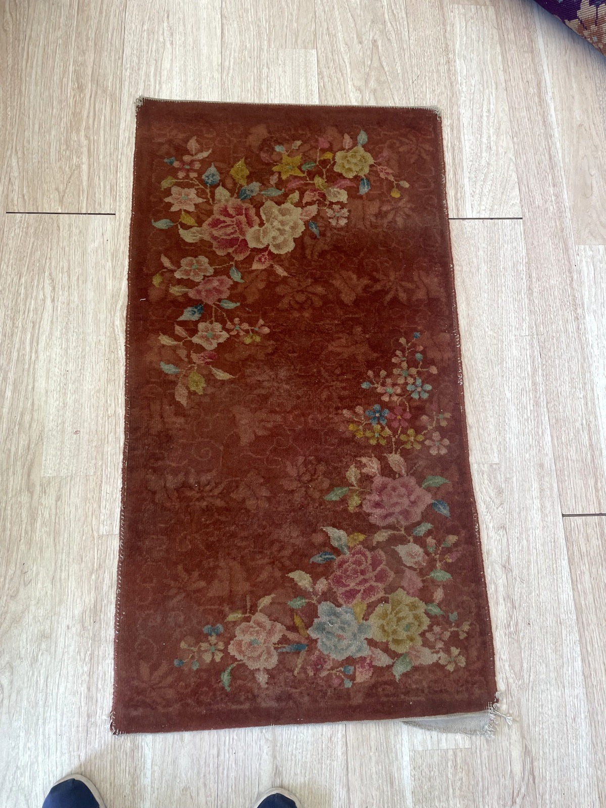Lower floral spray with pale blue, pink and yellow blossoms