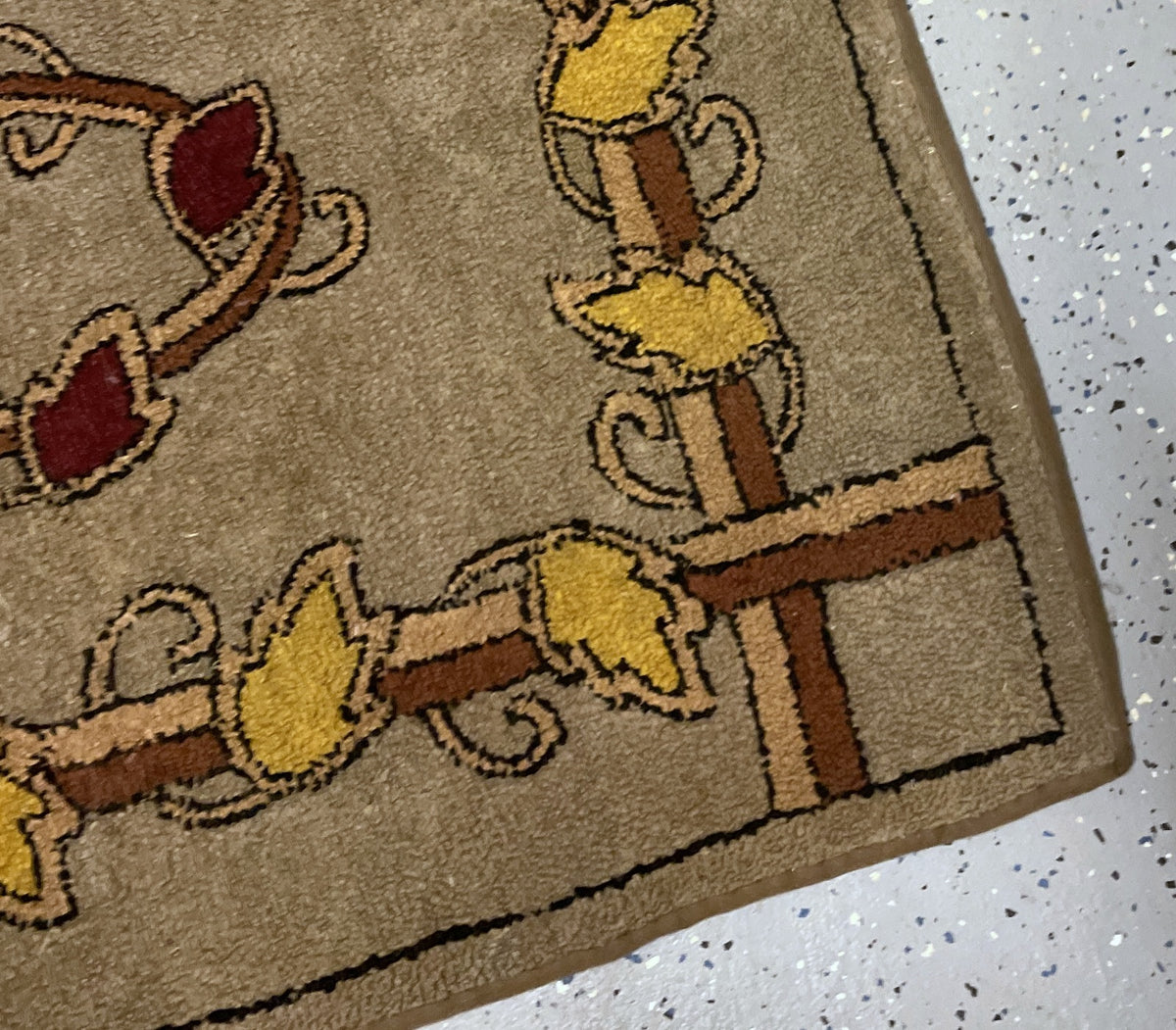 Full view of the botanical wool rug with an open grey-taupe ground and central oval wreath.