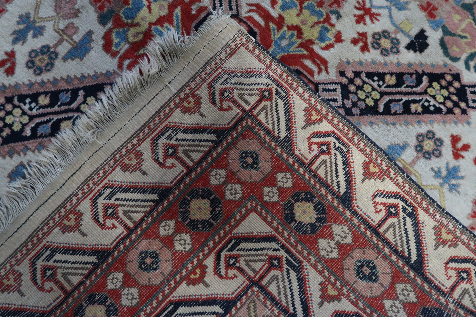 Back side view of handmade vintage Caucasian Zeyhur rug showcasing original craftsmanship
