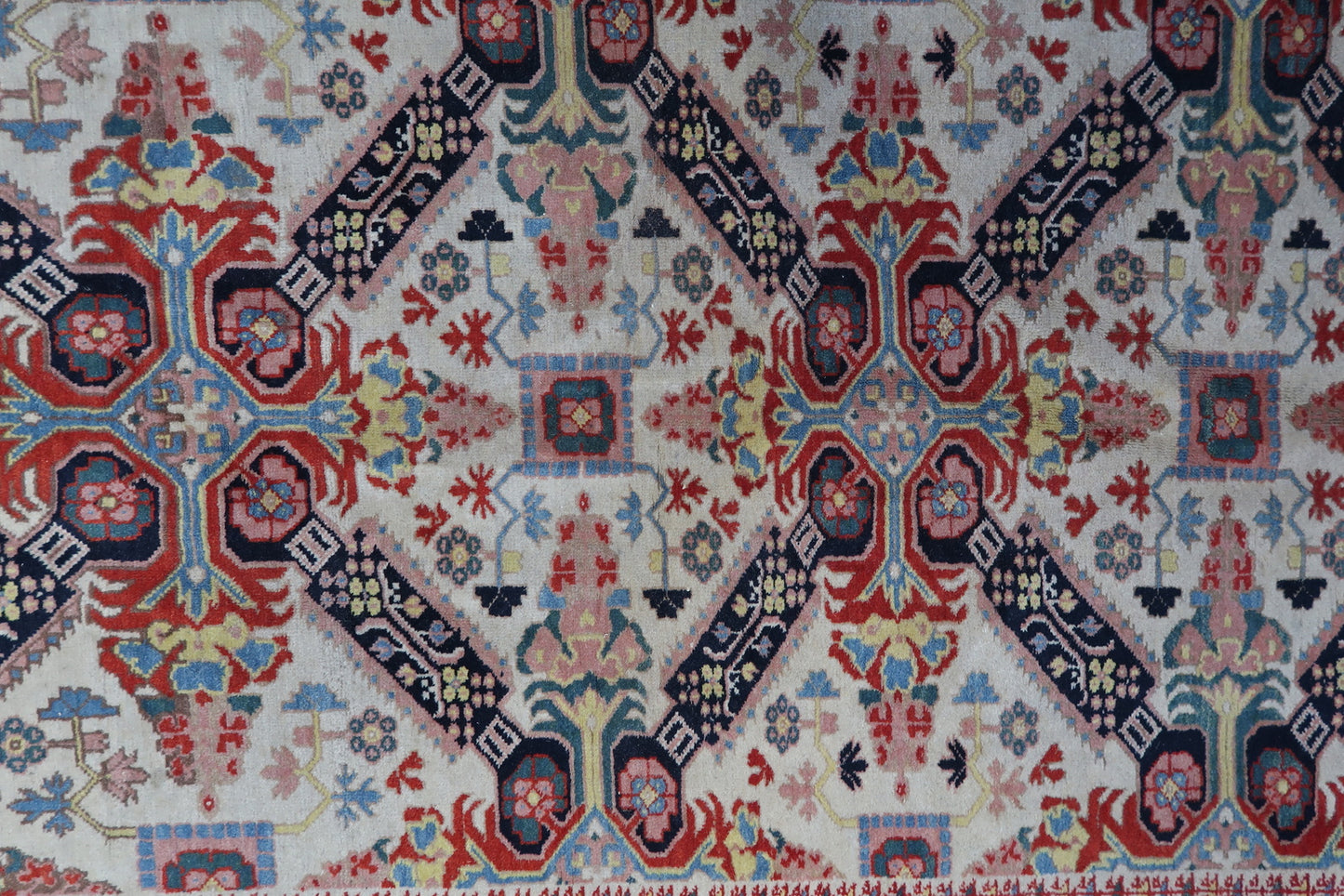 Close-up view showcasing the fine craftsmanship and historical charm of the rug