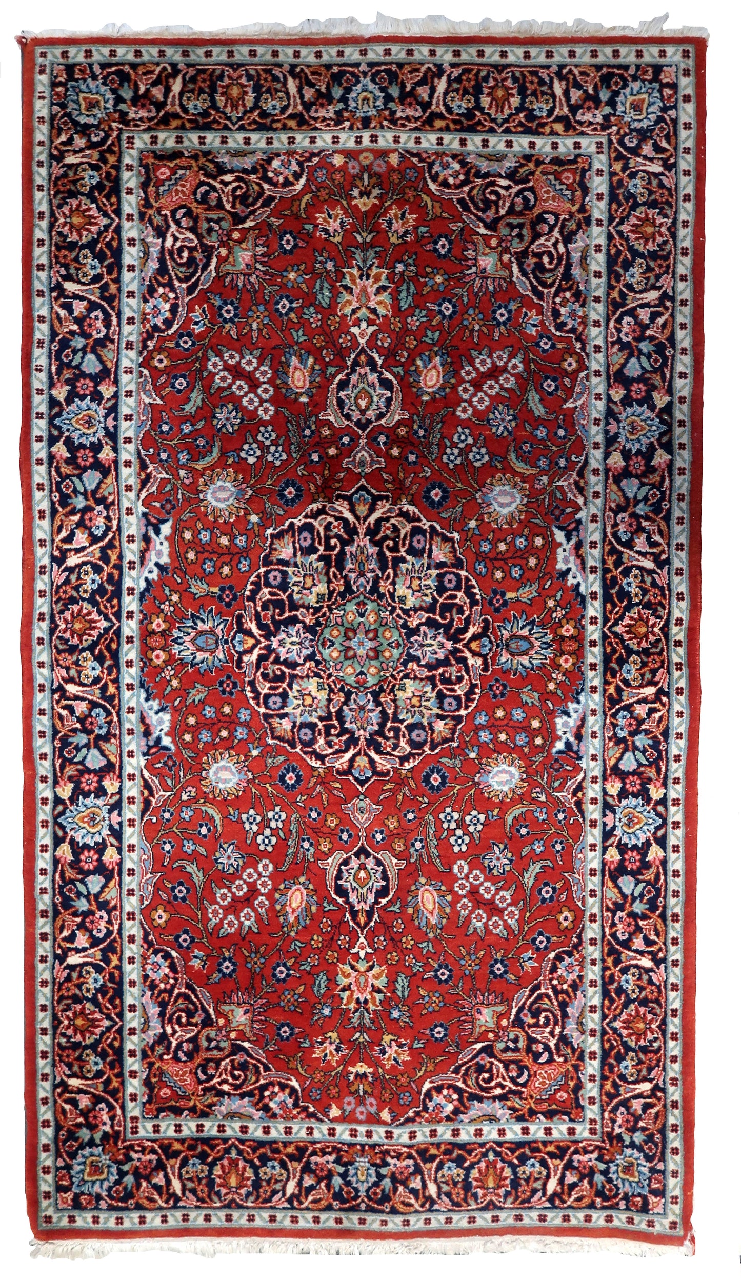  Handmade antique Persian Kashan rug with vibrant floral design on a red background