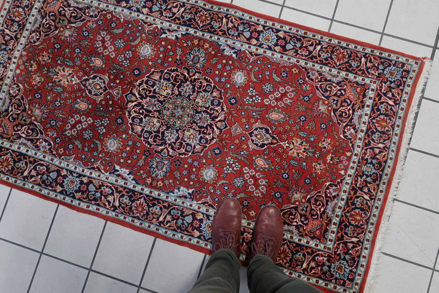 Close-up view highlighting the vibrant and shiny colors that bring the rug to life.
