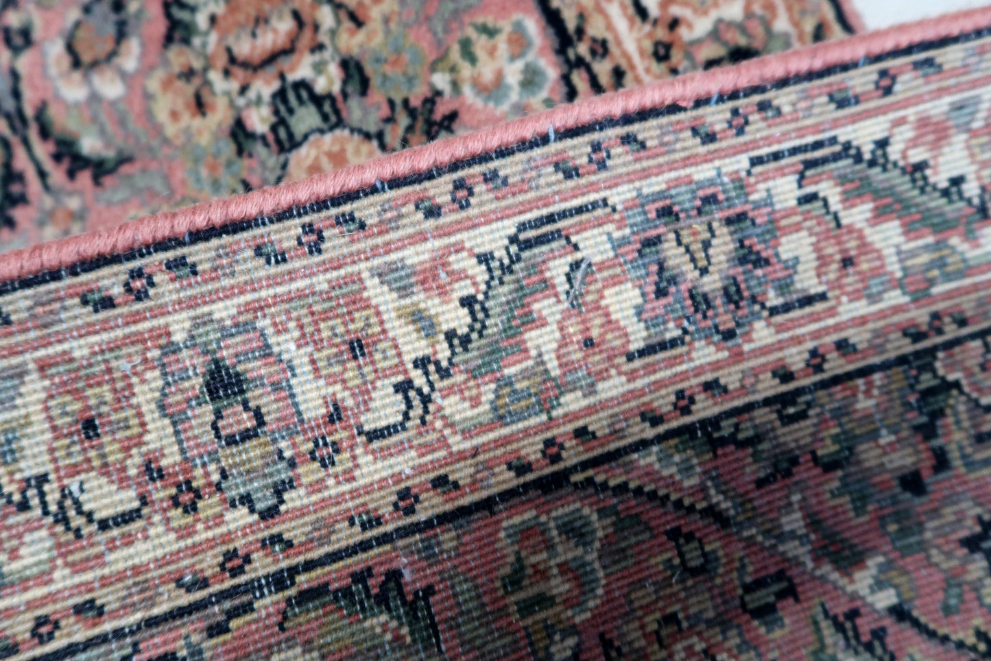 Back view of the handmade vintage Persian Kerman rug showcasing its original good condition and fine craftsmanship.