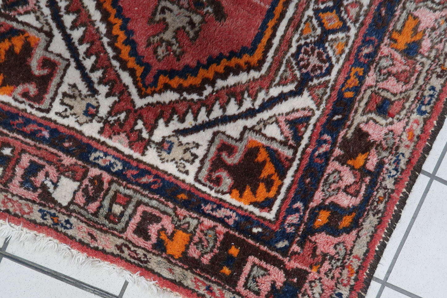 Detailed view of the soft wool texture on the surface of the rug