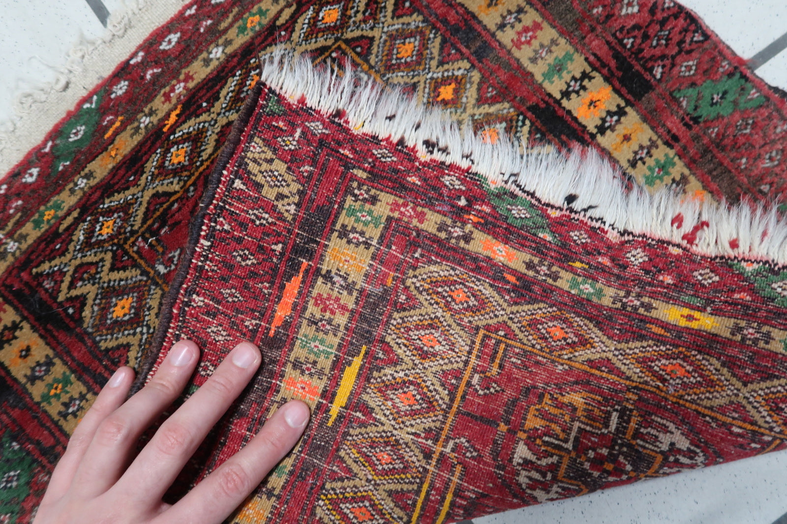 Back view of the handmade vintage Afghan Ersari mat