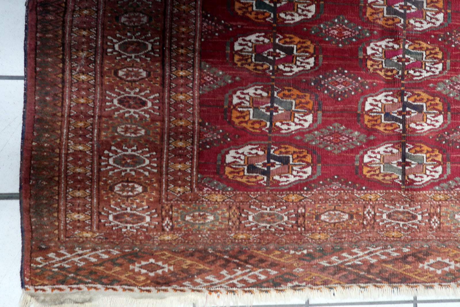 Close-up of intricate geometric pattern on the Handmade Vintage Uzbek Bukhara Rug