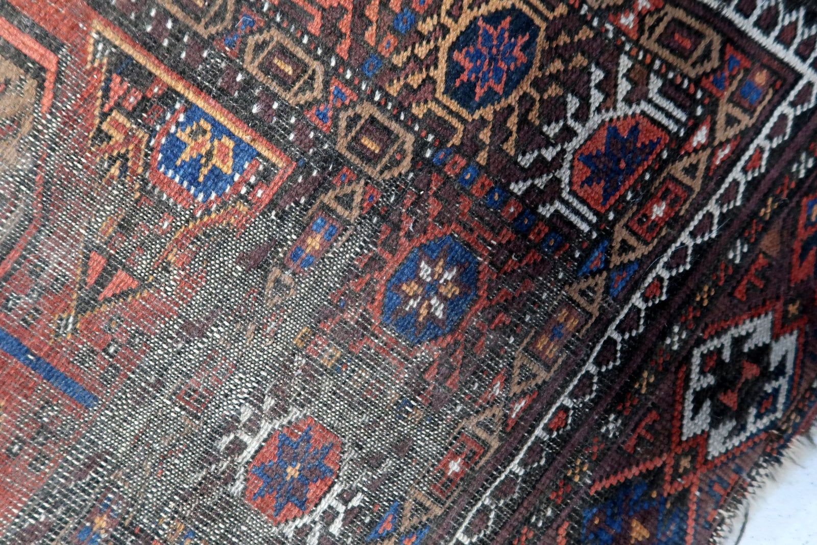 Close-up of Traditional Afghan Baluch Rug with Unique Design
