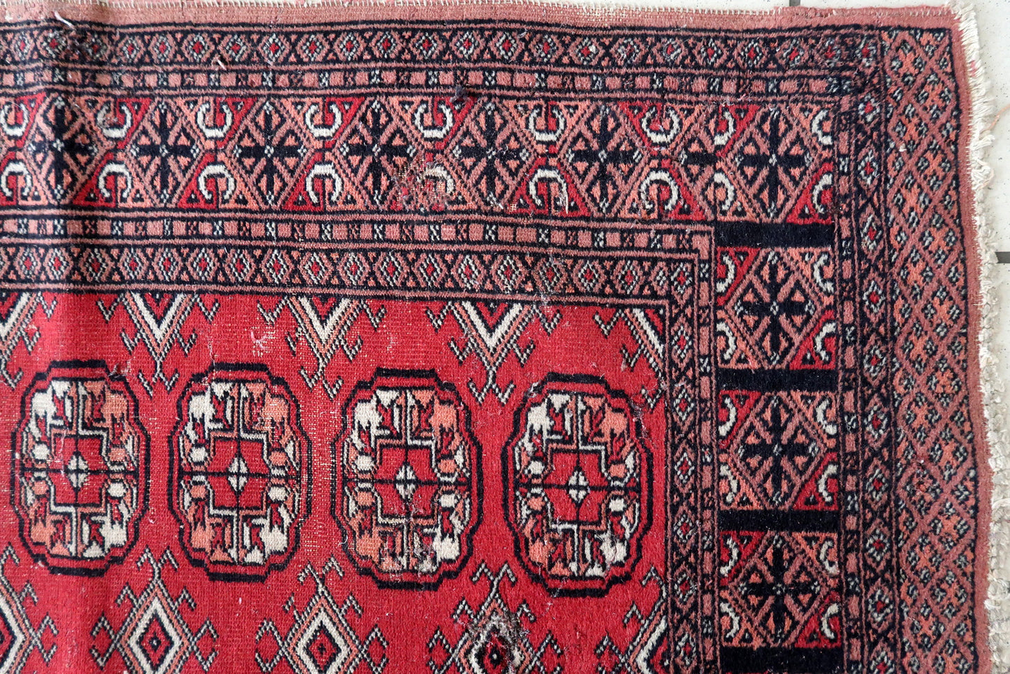 Close-up of the red and navy blue patterns