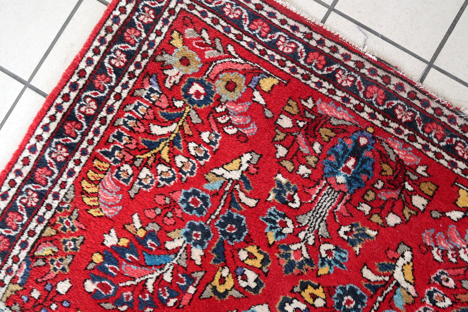 Intricate design with red and sky blue hues.