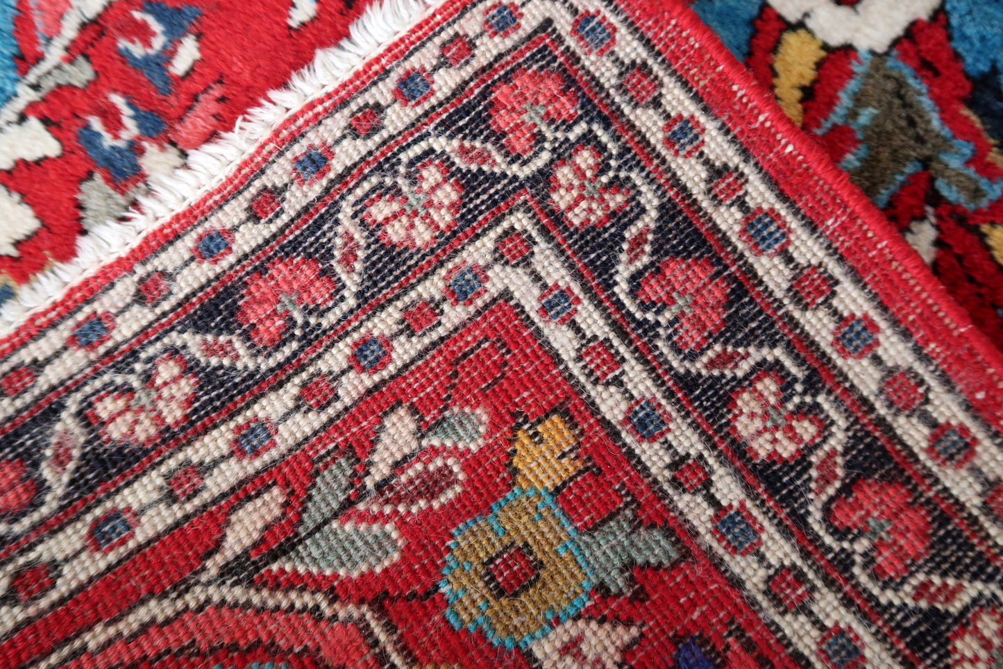 Back side of the Handmade Vintage Sarouk Rug, showcasing original good condition.