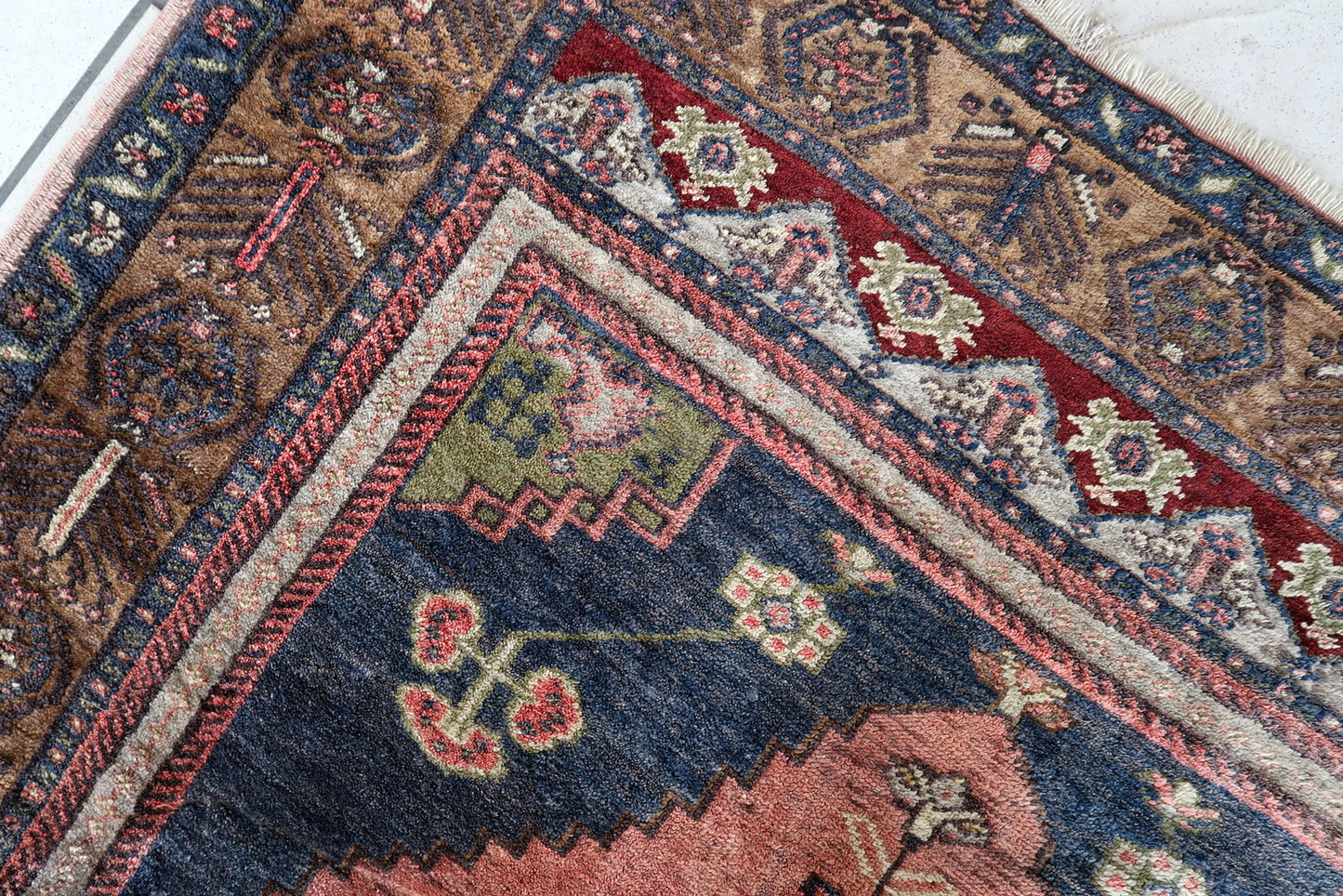 Close-up of Olive Brown Background on Turkish Rug