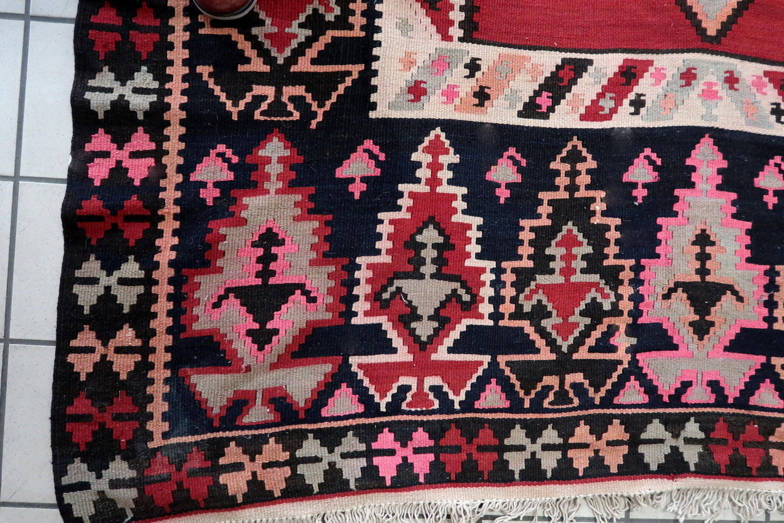 Close-up of Bright Red and Pink Patterns on Herati Kilim