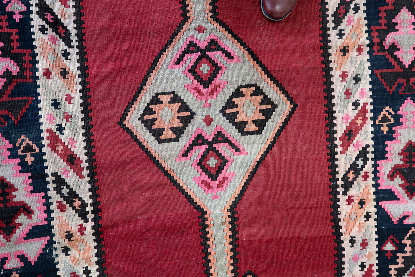 Vivid Red and Light Turquoise Accents on Kilim