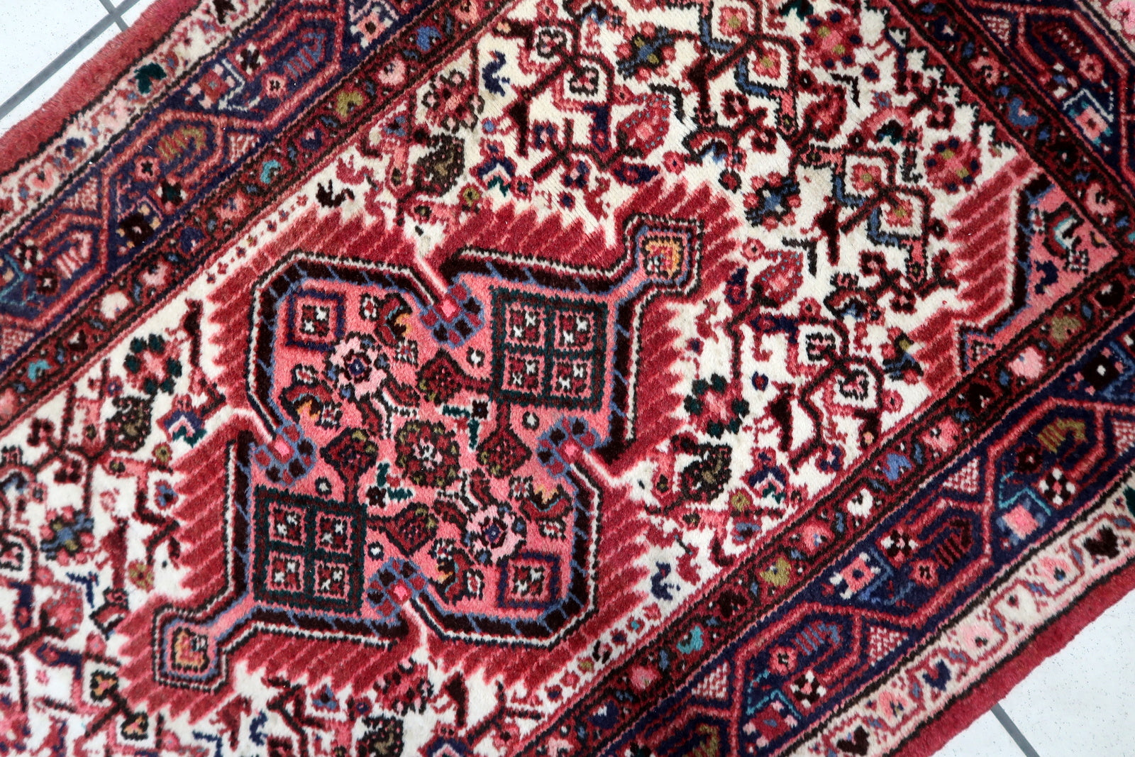 Pink Hues Highlighted in Handmade Rug