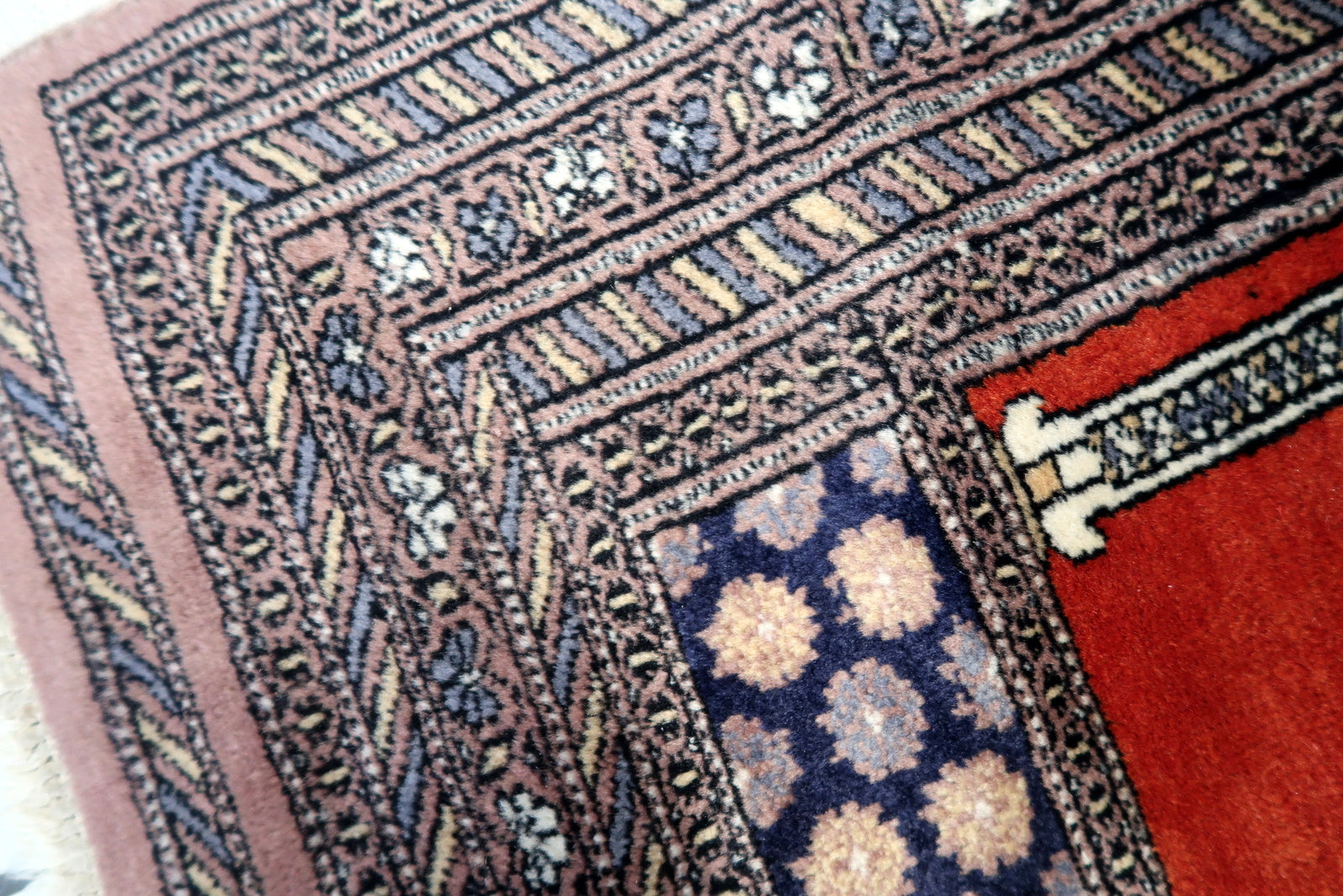 Close-up of the outermost layer boasting detailed artwork reminiscent of traditional craftsmanship